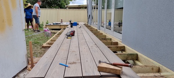 Decking boards laid over a new deck frame